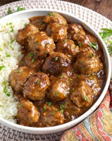 Instant Pot Turkey Meatballs and Gravy on a grey bowl.