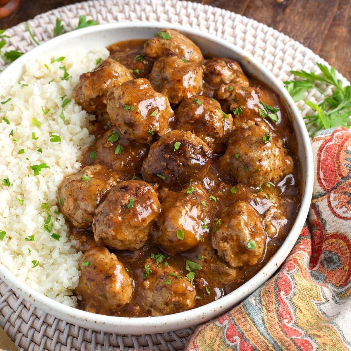 Instant Pot Turkey Meatballs and Gravy on a grey bowl.