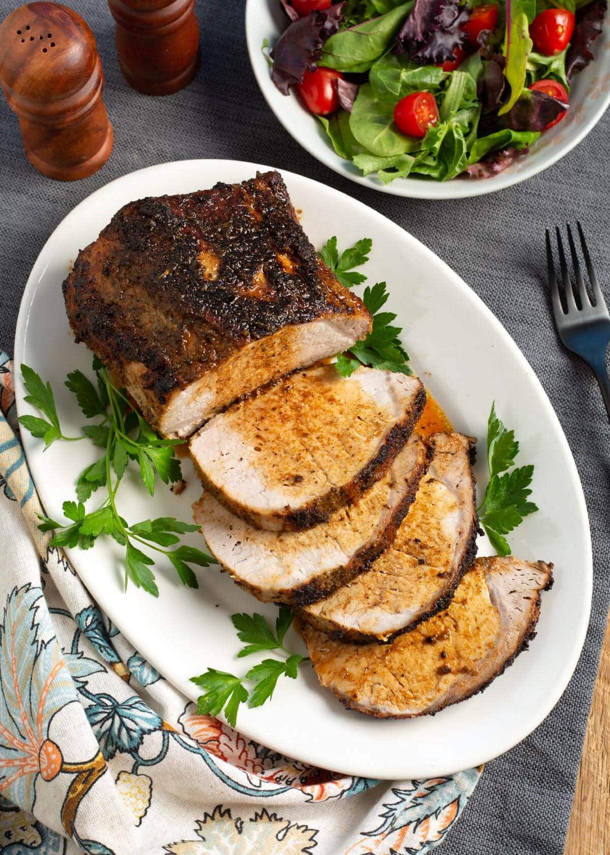 Air Fryer Pork Loin Roast on white platter