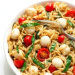 Caprese Orzo Pasta Salad in white bowl.