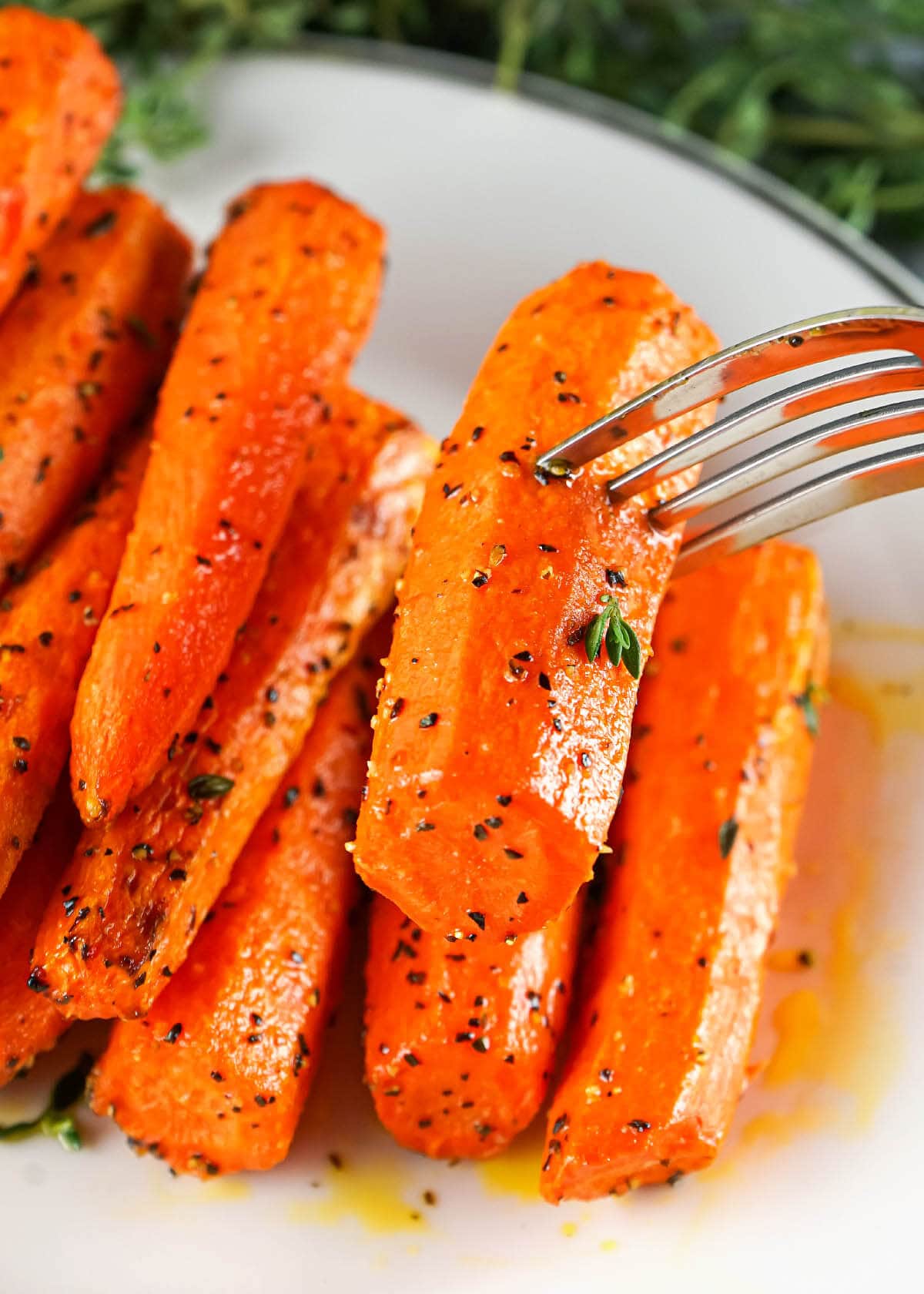 Carrots on fork.