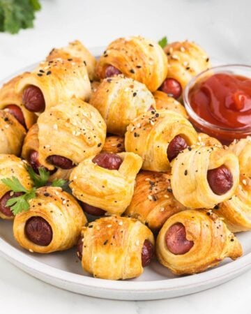 Air Fryer Pigs in a Blanket on a plate.