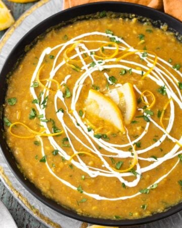 Instant Pot Red Lentil Curry Soup in black bowl