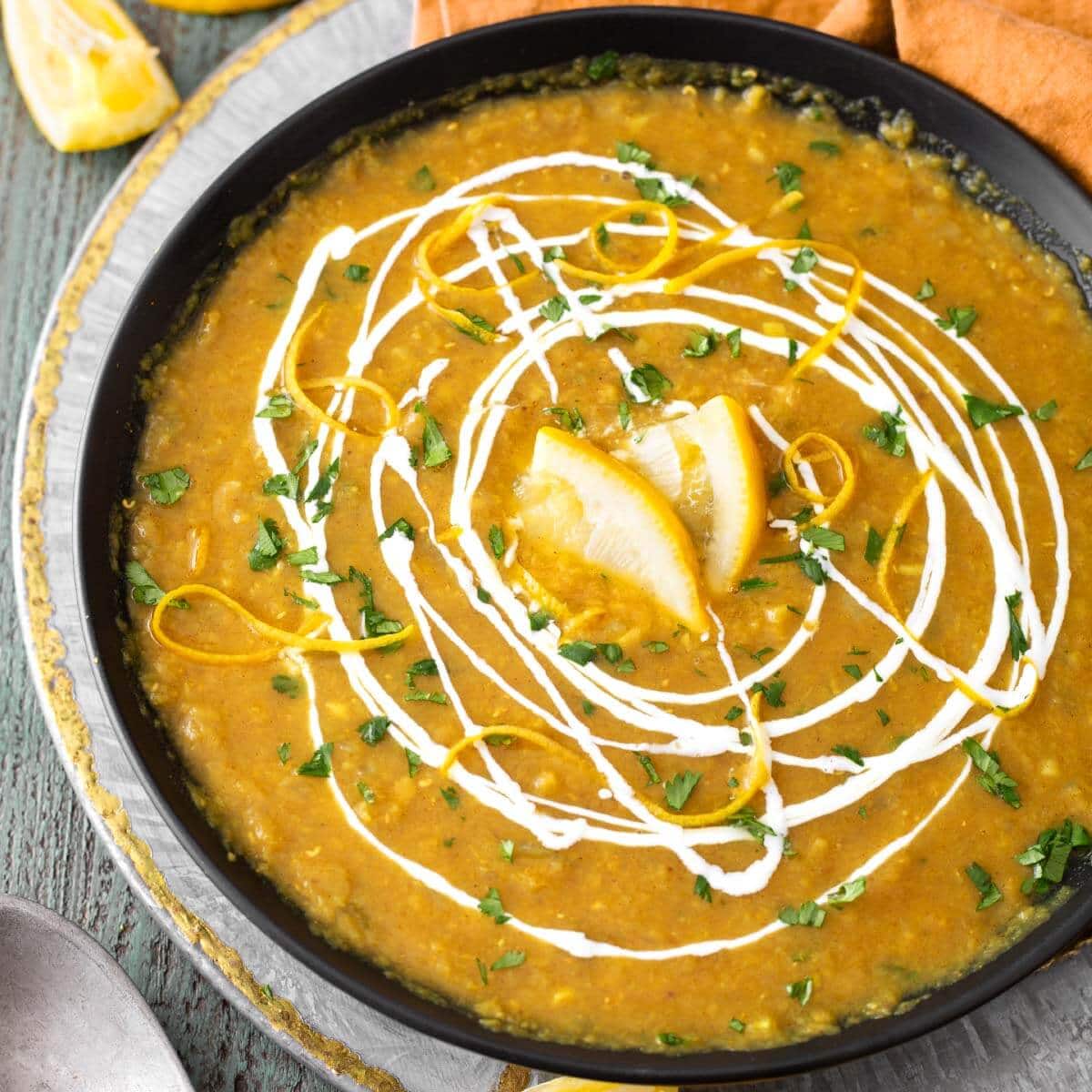 Instant Pot Red Lentil Curry Soup in black bowl