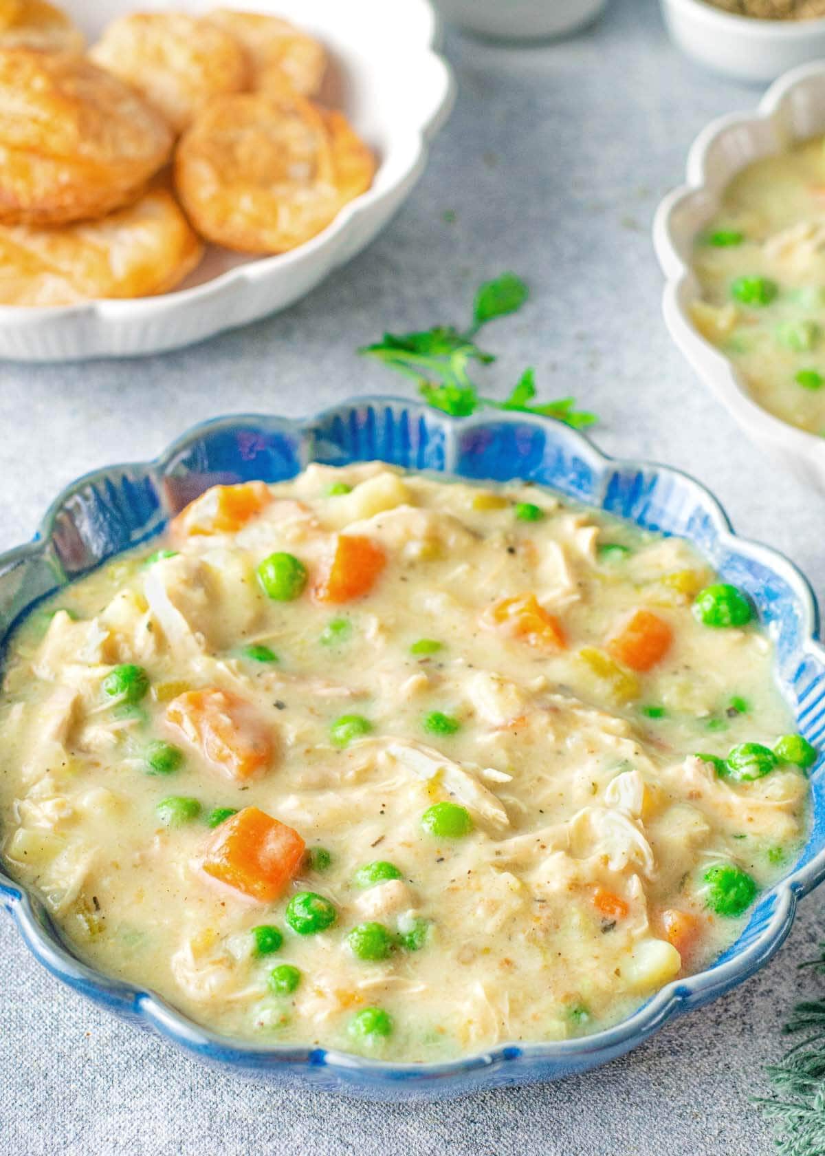 Instant Pot Chicken Pot Pie Soup in a blue bowl.