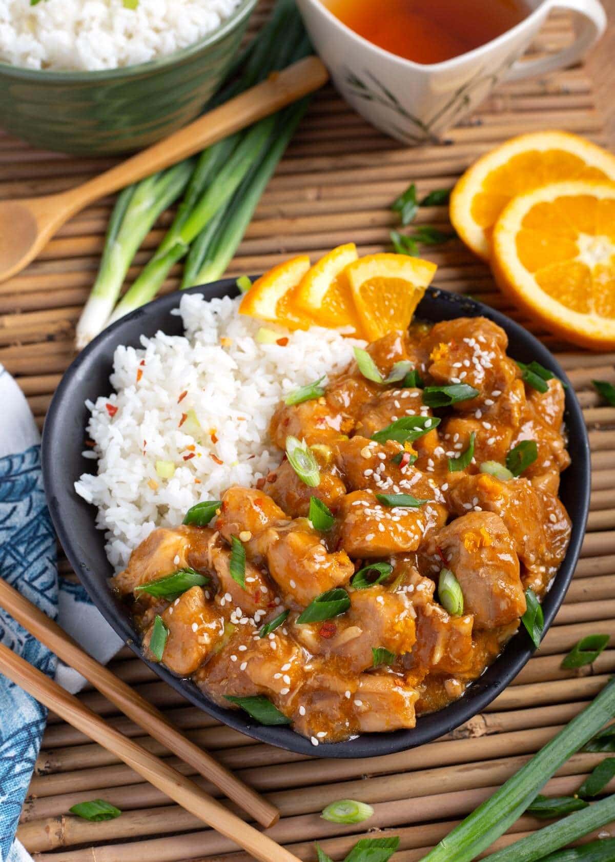 Instant Pot Orange Chicken in a black dish.