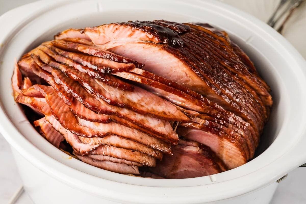 cooked spiral Slow Cooker Ham in crock