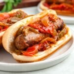 sausage and peppers on a bun.