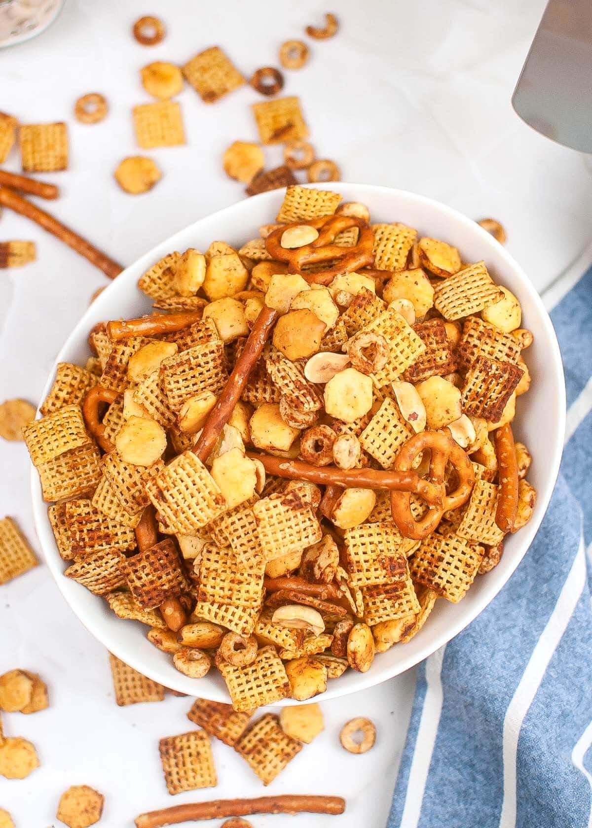 Air Fryer Chex Mix in a white bowl.