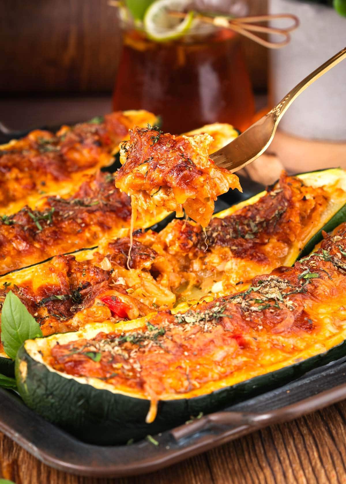 bite of stuffed zucchini on a fork.