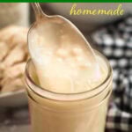 Condensed Cream of Chicken Soup in a jar with some on a spoon.