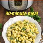 Instant Pot Chicken Pesto Pasta in a white bowl