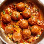 Salisbury Steak Meatballs and gravy in a skillet.