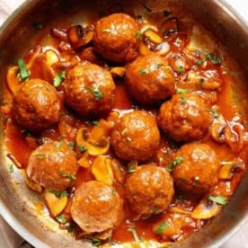 Salisbury Steak Meatballs and gravy in a skillet.