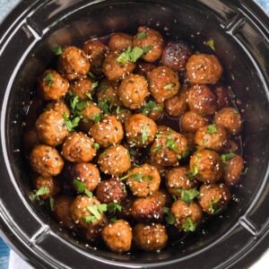 Meatballs in a black crock