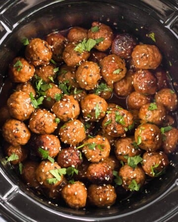 Meatballs in a black crock