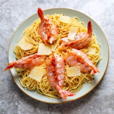 Lemony Capellini with Shrimp on blue plate
