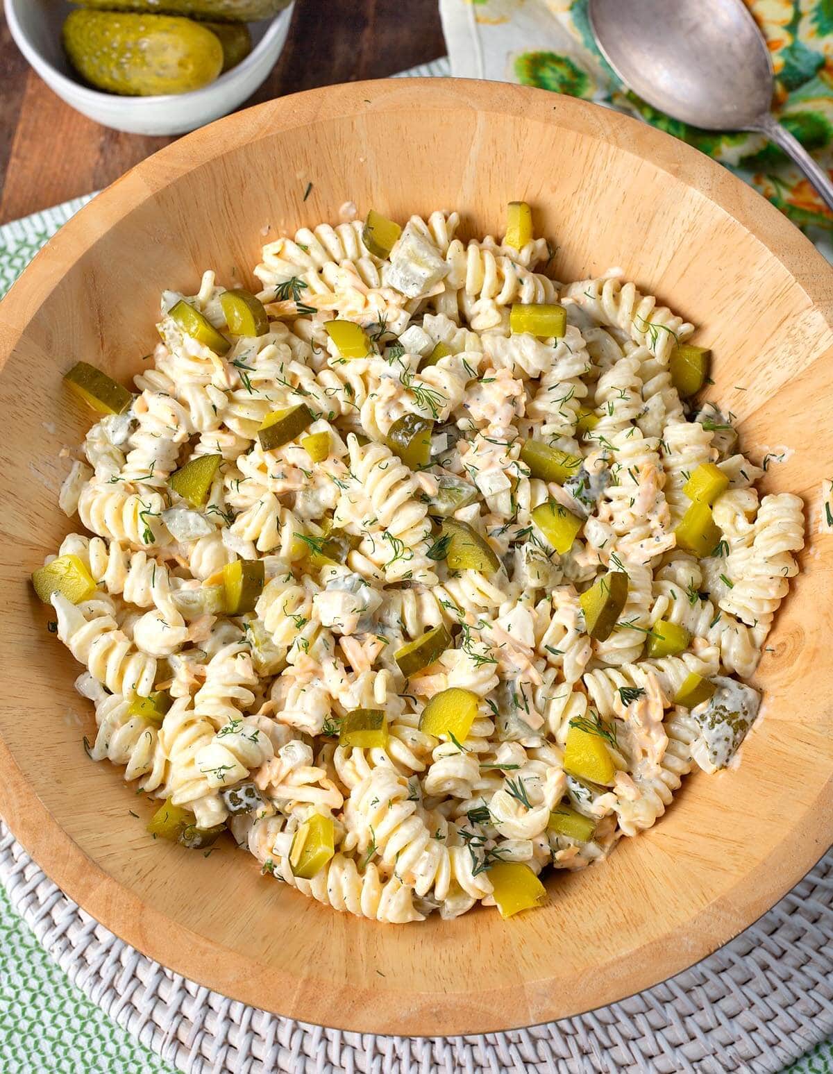 Dill Pickle Pasta Salad in wood bowl.
