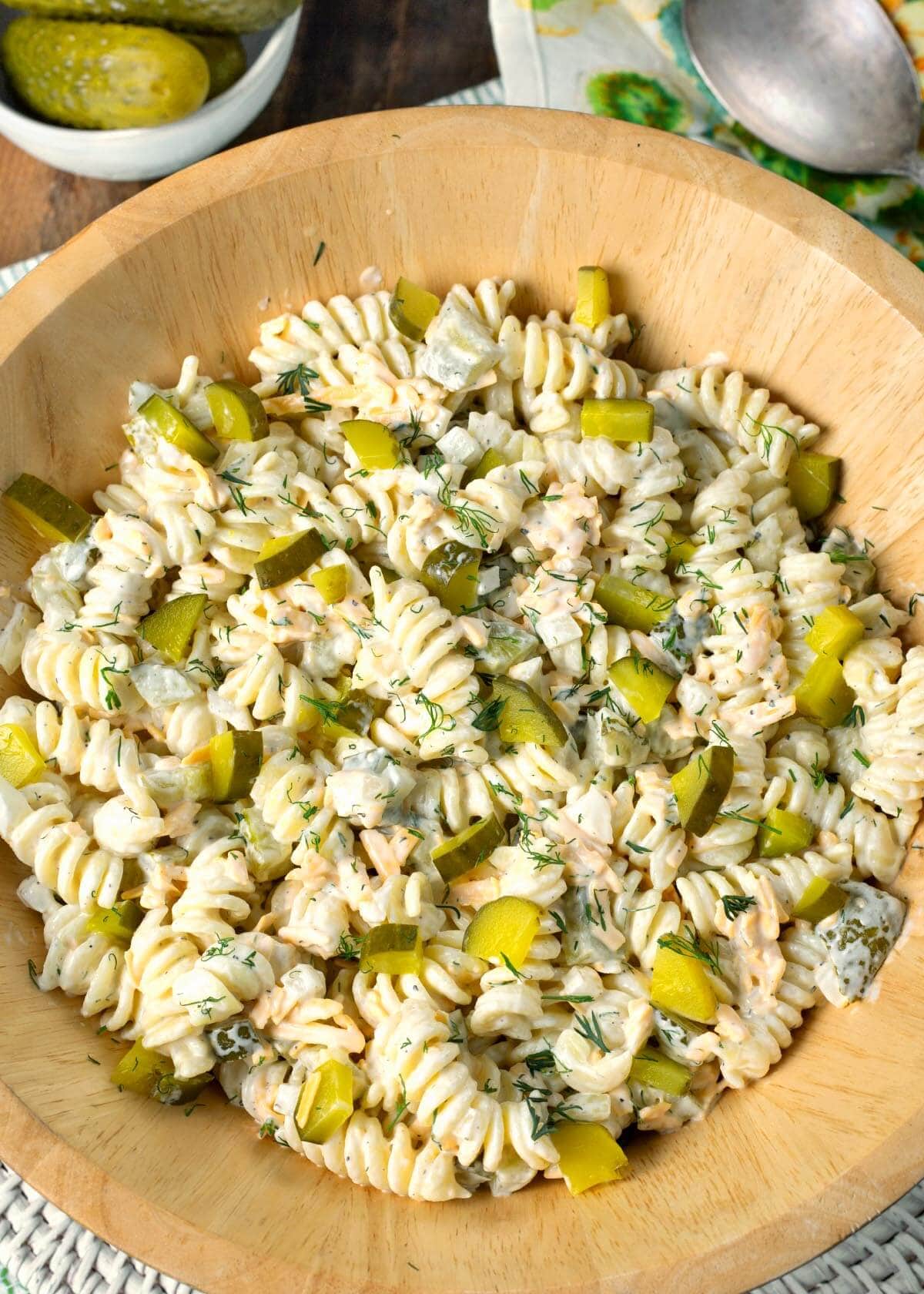Dill Pickle Pasta Salad in wood bowl.