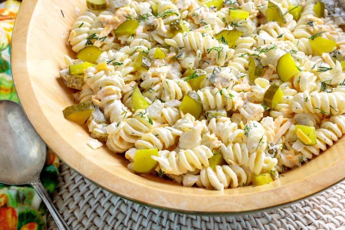 Dill Pickle Pasta Salad in wood bowl.