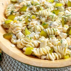 Dill Pickle Pasta Salad in wood bowl.