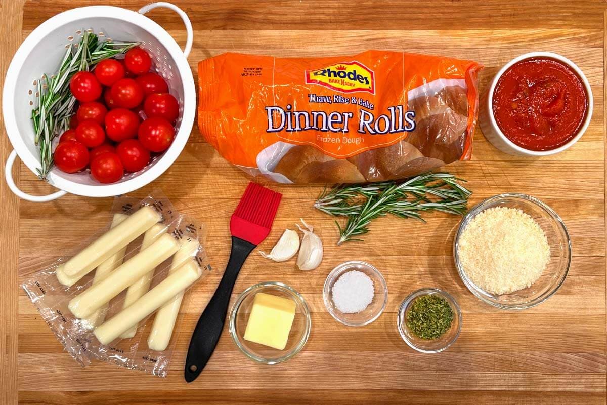 Dinner Roll Christmas Tree Appetizer ingredients shot on a board.