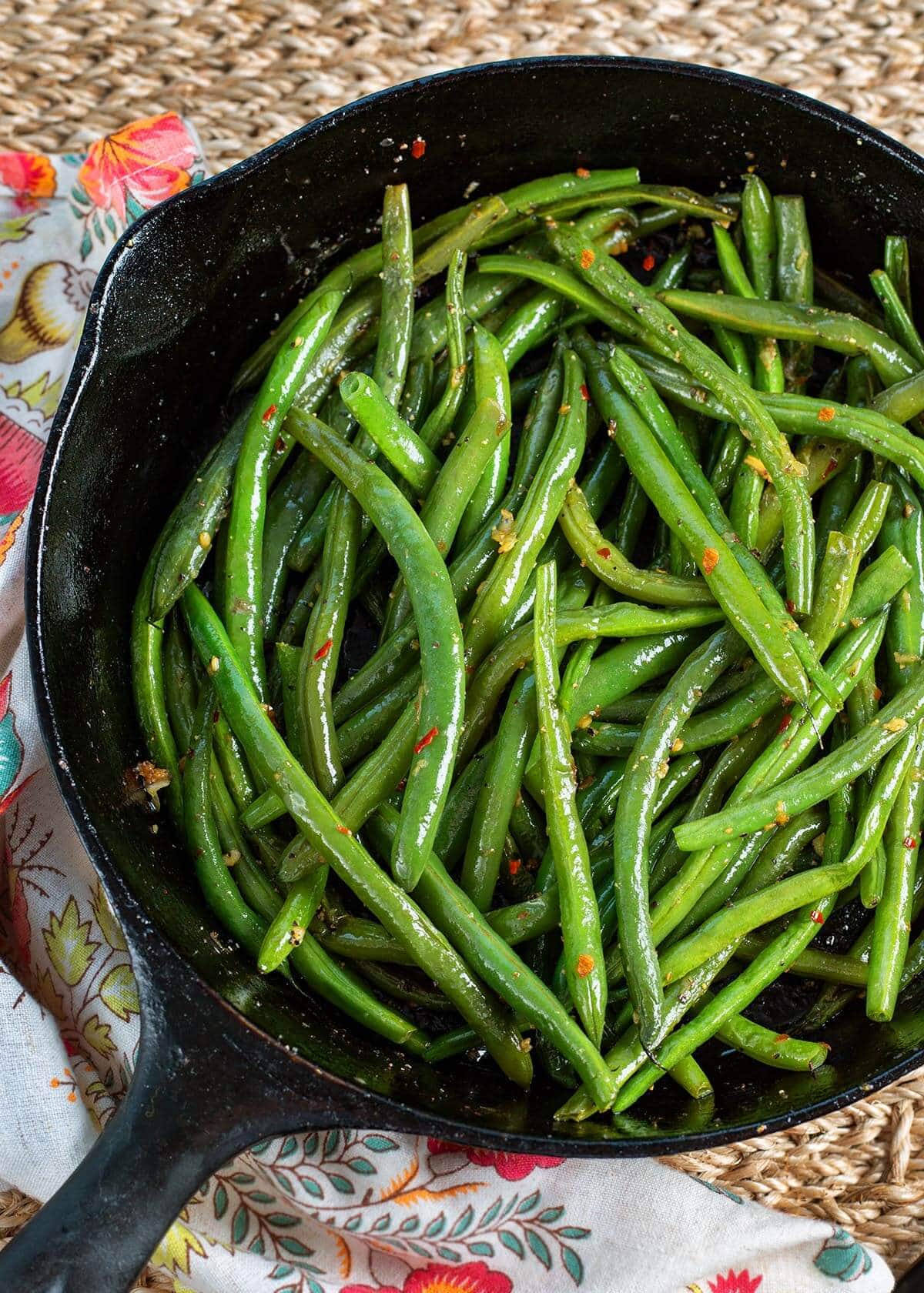 cooked Green Beans in a cast iron skillet