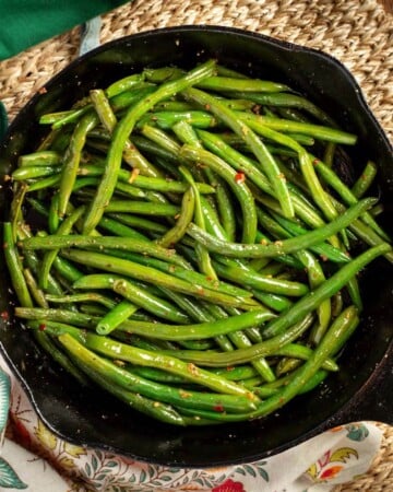 cooked Green Beans in a cast iron skillet