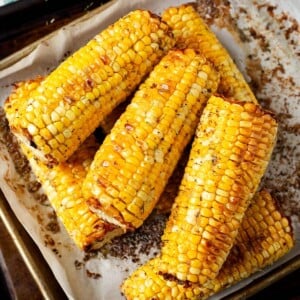 Oven Roasted Corn on the Cob on a baking sheet.
