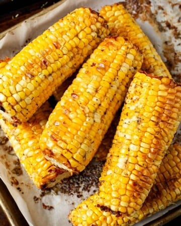 Oven Roasted Corn on the Cob on a baking sheet.