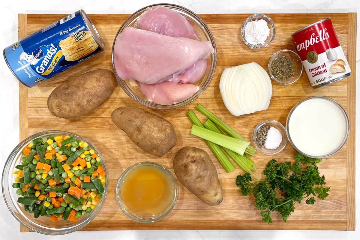 Slow Cooker Chicken Pot Pie ingredients shot on board