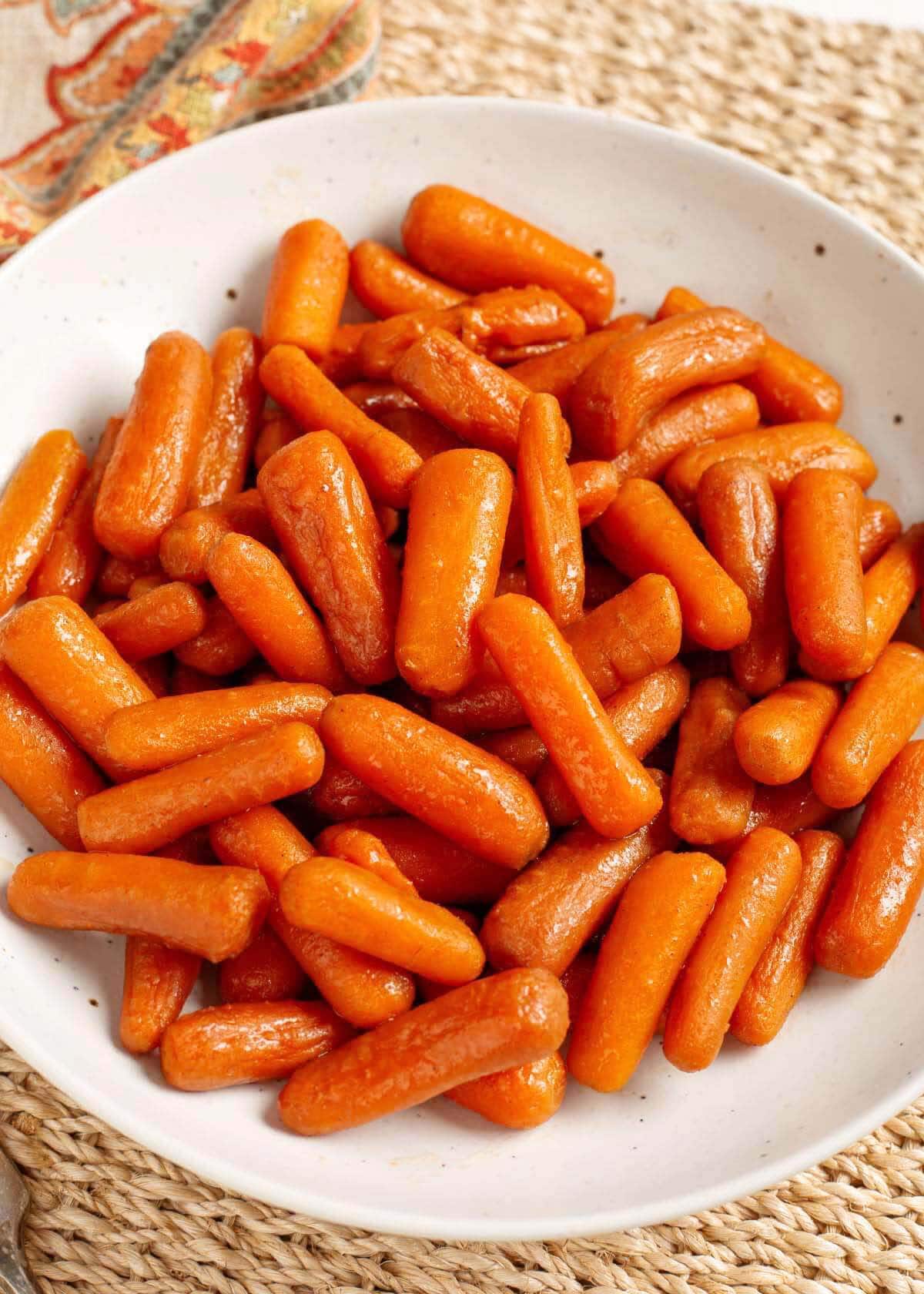 Slow Cooker Maple Brown Sugar Carrots in a white bowl