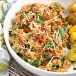 Slow Cooker Marry Me Chicken in a white bowl.