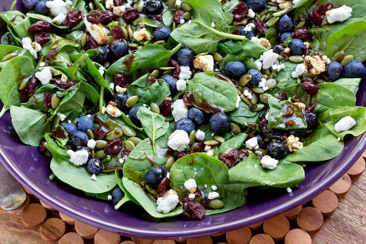 Blueberry Spinach Salad in purple bowl