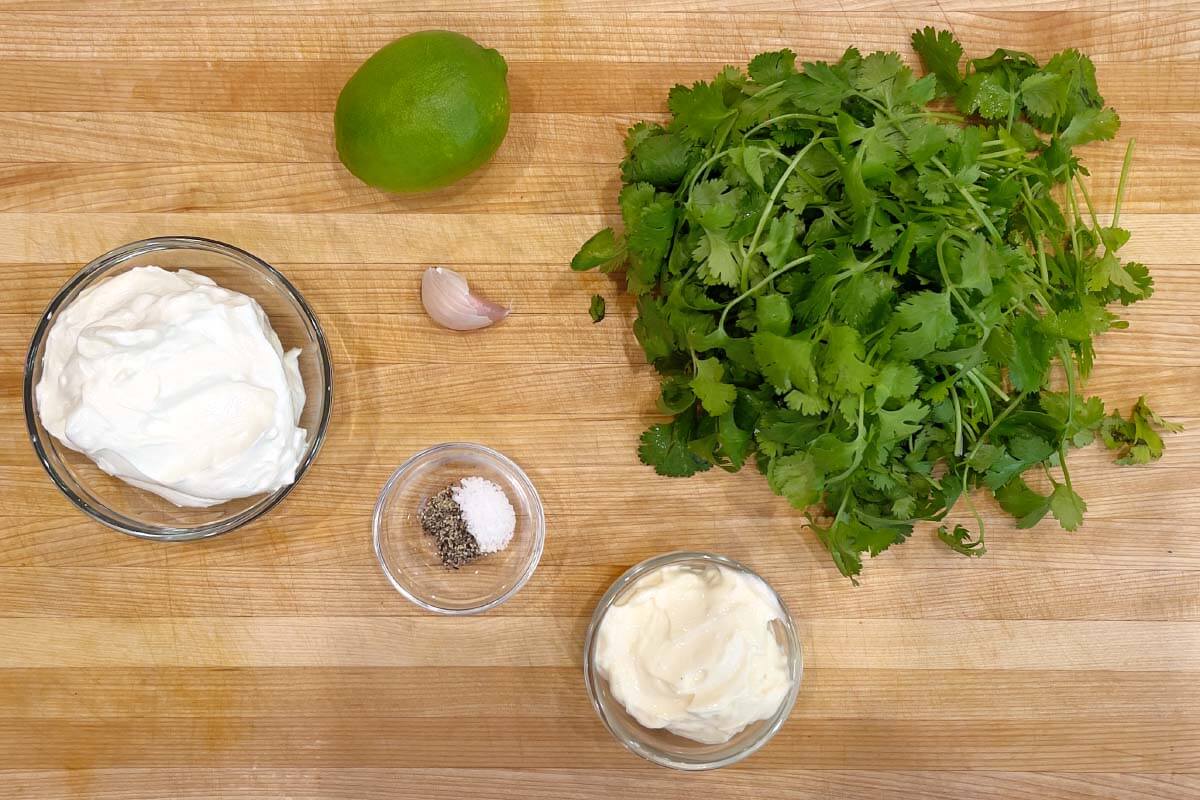 Cilantro Cream Sauce ingredients on a board