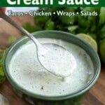 Cilantro Cream Sauce in a green bowl with a spoon