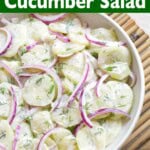 Creamy Dill Cucumber Salad in a white bowl closeup.