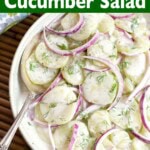 Creamy Dill Cucumber Salad in a white bowl closeup.