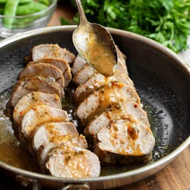 2 Pork Tenderloins sliced in a skillet