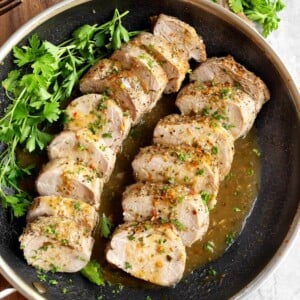 2 Pork Tenderloins sliced in a skillet
