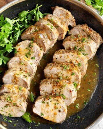2 Pork Tenderloins sliced in a skillet