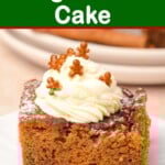 a piece of Old-Fashioned Gingerbread Cake with whipped cream on top