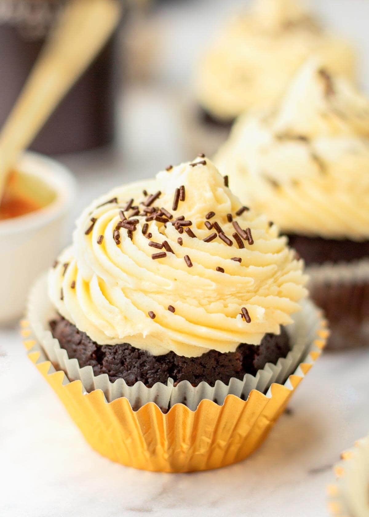 frosted Cupcake with liner gold liner