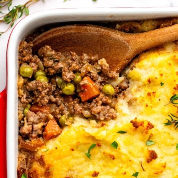 Irish Cottage Pie in a baking dish with wooden spoon