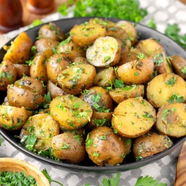Slow Cooker Garlic Herb Potatoes in a black bowl