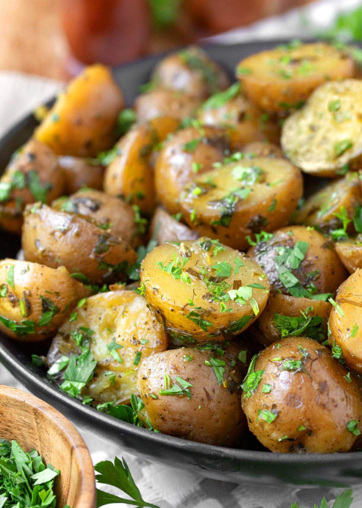 Slow Cooker Garlic Herb Potatoes in a bowl closeup