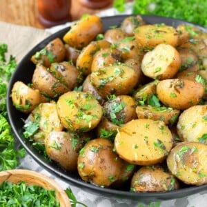 Slow Cooker Garlic Herb Potatoes in a black bowl