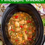 Slow Cooker Pineapple Chicken in a black crock