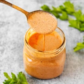 Southwest Buttermilk Chicken Marinade in a mason jar with a spoon