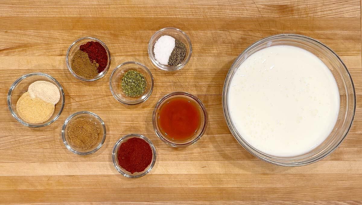 Southwest Buttermilk Chicken Marinade ingredients on a board.